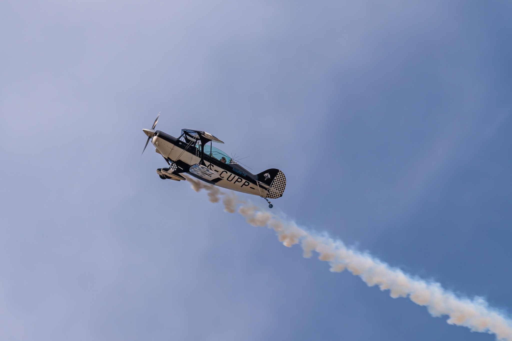 Aerobatic biplane flypast above Truleigh Farm Fest 2026