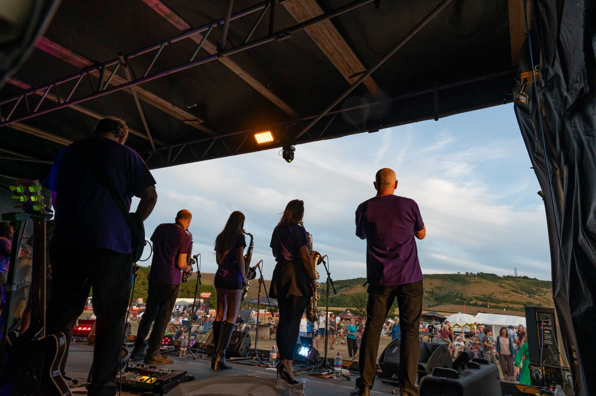 View from the Truleigh Farm Fest stage towards the crowd and South Downs